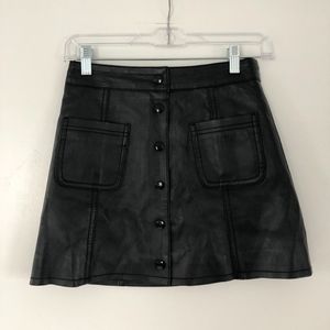 Black faux leather mini skirt
